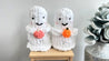 Ghost holding a pumpkin